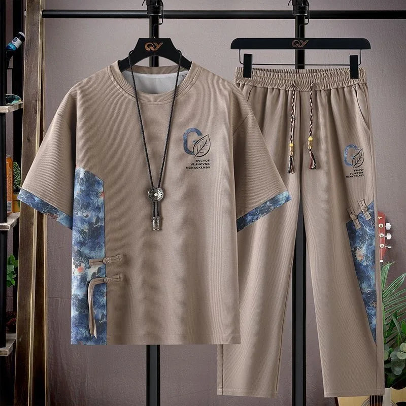 Sommar Ny Modetrend Tryckt Kortärmad T-shirt Sportdräkt Herr Löst Bekvämt Andningsbart Tvådelat Set Stor Storlek