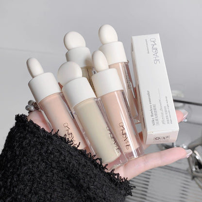 Flawless Finish Flytande Concealer Full täckning för blemmor Mörka ringar och fräknar Smidig applicering Långvarig,