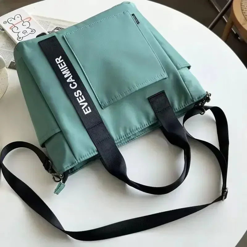 Ny Casual Tote Stor Kapacitet Axelväska Nylon Vattentät Canvas Handväska Enkla Mode Messenger Väskor För Skolflickor