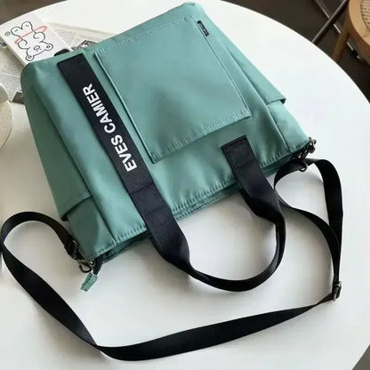 Ny Casual Tote Stor Kapacitet Axelväska Nylon Vattentät Canvas Handväska Enkla Mode Messenger Väskor För Skolflickor
