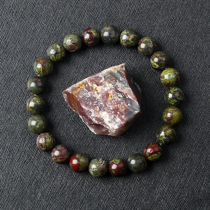 Naturlig drakeblodsten elastiska armband kvinnor män charm dinosaurie jaspis pärlor helande smycken yoga meditation armband gåva