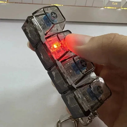 Ny Stress Ångest Lindring Tangentbord Nyckelring Fyrfingerknapp för Kontor Hem Vuxna Barn Dekompression Klicker Heta Gadget Presenter