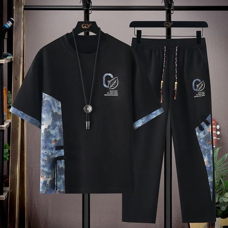 Sommar Ny Modetrend Tryckt Kortärmad T-shirt Sportdräkt Herr Löst Bekvämt Andningsbart Tvådelat Set Stor Storlek