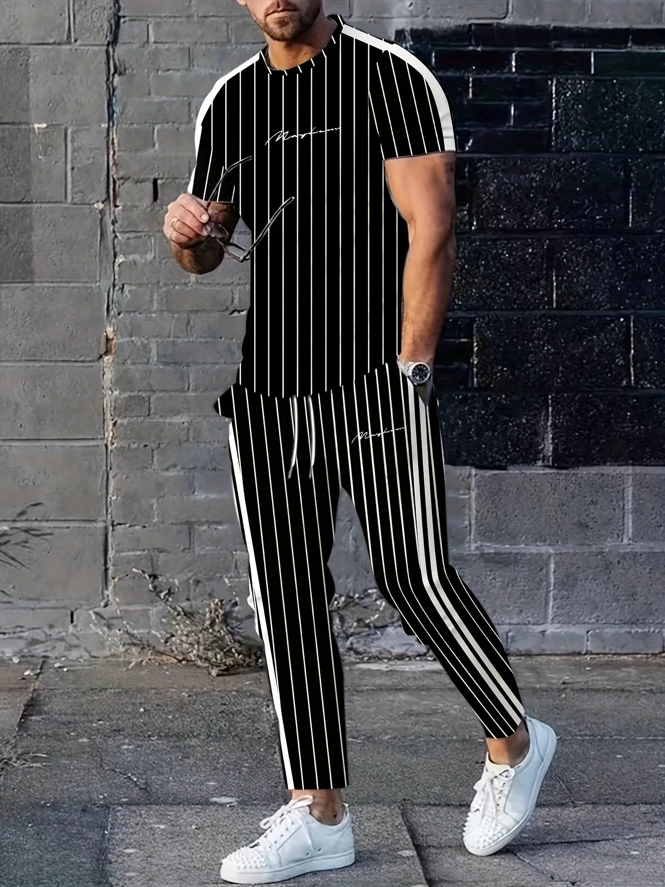 Ett nytt streetwear-set för män för sommaren 2025 med enkla, avslappnade, trendiga, sportiga och bekväma vertikala 3D-bokstäver