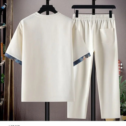 Sommar Ny Modetrend Tryckt Kortärmad T-shirt Sportdräkt Herr Löst Bekvämt Andningsbart Tvådelat Set Stor Storlek
