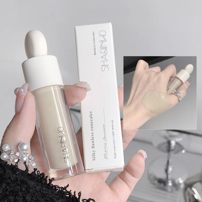 Flawless Finish Flytande Concealer Full täckning för blemmor Mörka ringar och fräknar Smidig applicering Långvarig,