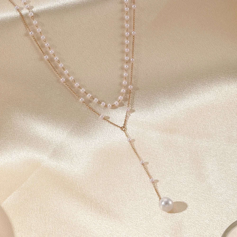 Charm Trendiga Dubbeldekade Imiterade Pärlor Långa Hängsmycken Halsband för Kvinnor Temperament Sommar Strandsmycken Accessoarer