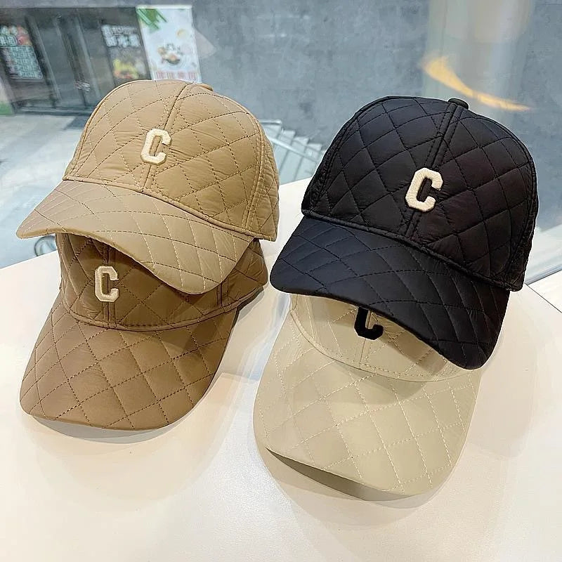 En varm baseballkeps i nischdesign med pressad bomull och vinterbroderade bokstäver, enkel parkeps i anknäbbsmodell.