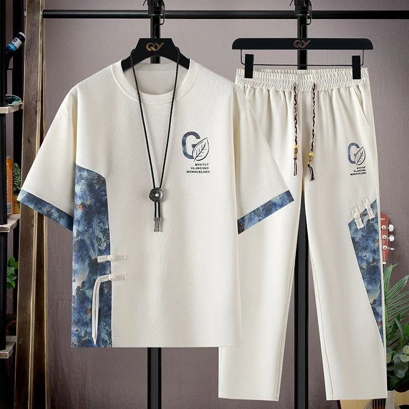 Sommar Ny Modetrend Tryckt Kortärmad T-shirt Sportdräkt Herr Löst Bekvämt Andningsbart Tvådelat Set Stor Storlek