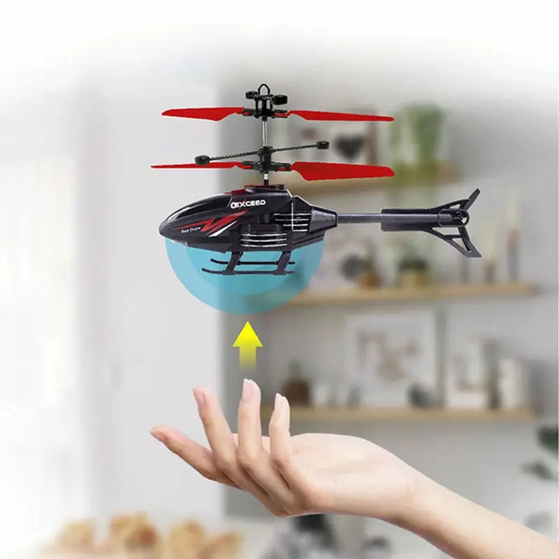 RC Helikopter 2CH Induktionsfjärrkontroll Flytande Flygplan Geststyrt Flygplansupphängning Quadcopter med LED Barnpresent