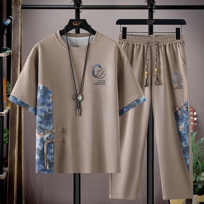 Sommar Ny Modetrend Tryckt Kortärmad T-shirt Sportdräkt Herr Löst Bekvämt Andningsbart Tvådelat Set Stor Storlek