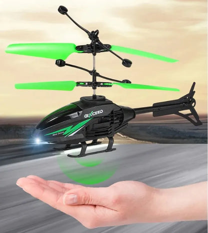 RC Helikopter 2CH Induktionsfjärrkontroll Flytande Flygplan Geststyrt Flygplansupphängning Quadcopter med LED Barnpresent