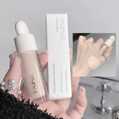 Flawless Finish Flytande Concealer Full täckning för blemmor Mörka ringar och fräknar Smidig applicering Långvarig,